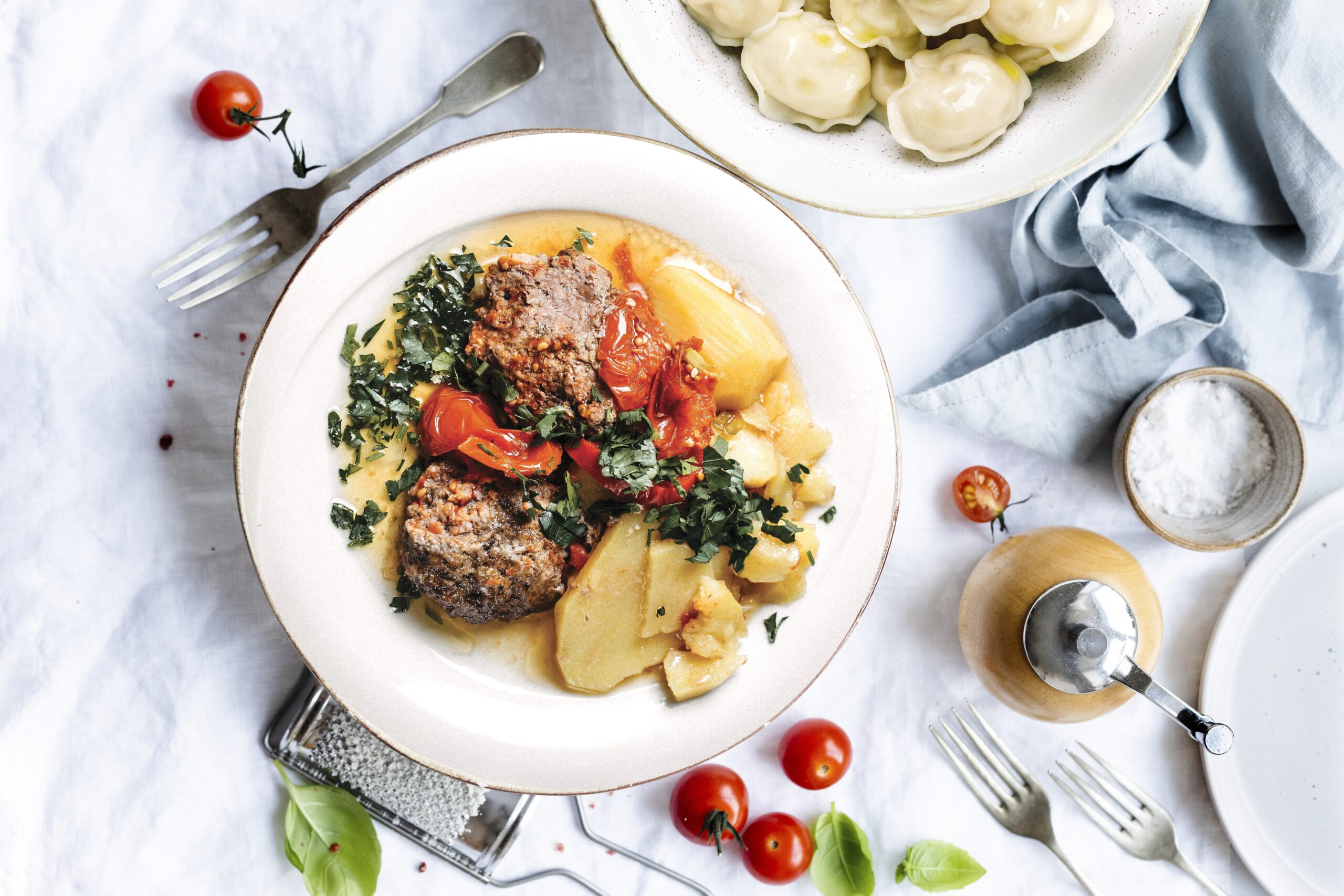 Spaghetti meatball topped with parmesan and basil food photography